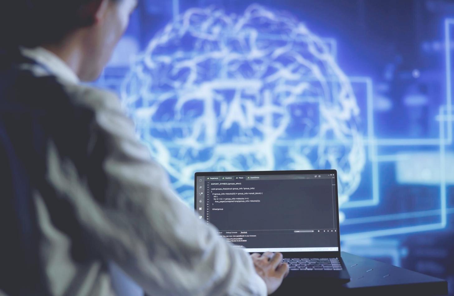 Financial data analysis workspace with multiple monitors displaying real-time market data and machine learning models