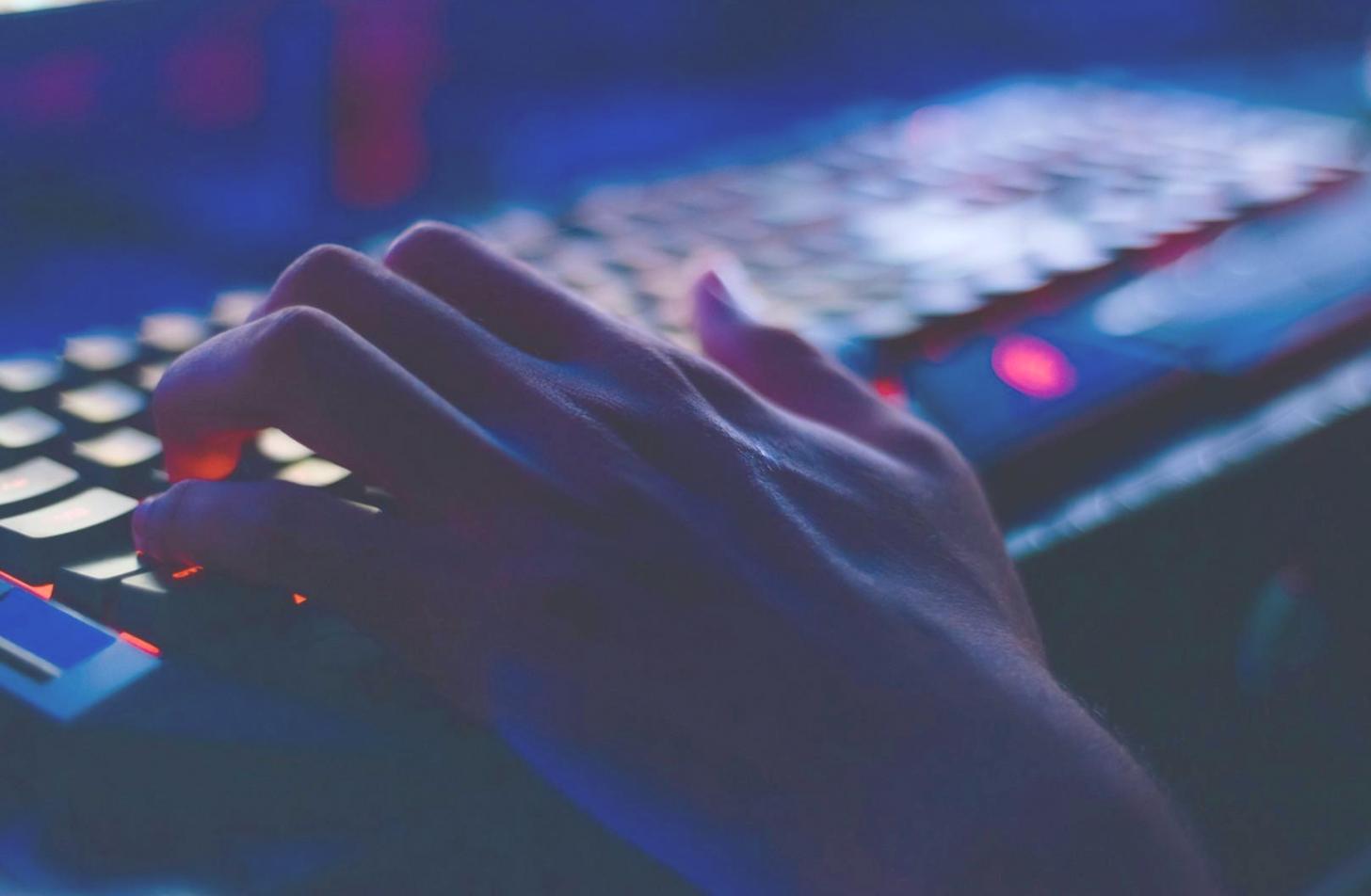 Team collaboration session reviewing machine learning model outputs on large display screens