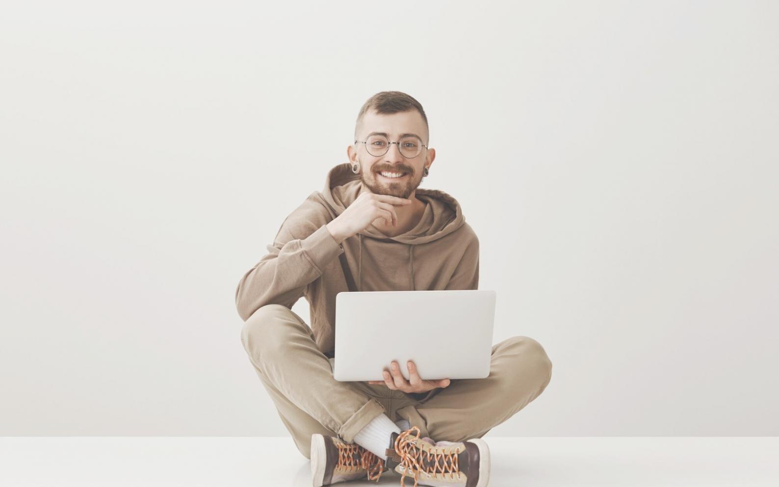 Financial data analysis workspace with multiple monitors displaying real-time market analytics